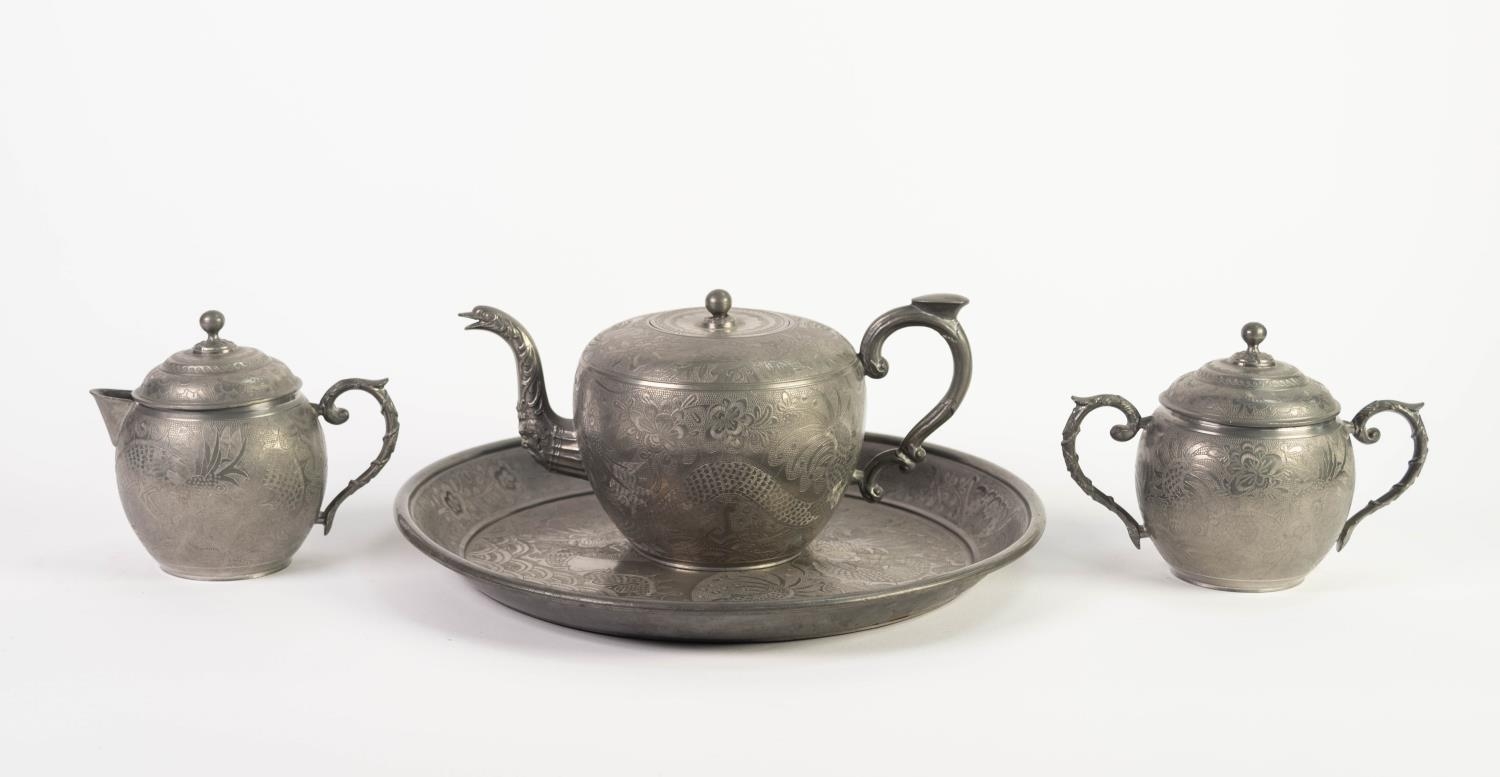 KUTHING SWATOW, CHINESE THREE PIECE ENGRAVED PEWTER TEASET, of ovoid form with scroll handles,