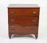 EARLY NINETEENTH CENTURY CROSSBANDED MAHOGANY SMALL CHEST OF DRAWERS, the oblong top above three