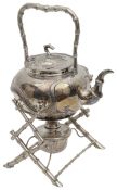 A late 19th century Chinese export silver kettle and stand