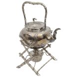 A late 19th century Chinese export silver kettle and stand