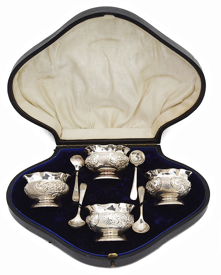 A late Victorian cased set of four silver salts