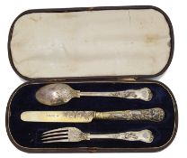 A three piece Victorian silver gilt Stag Hunt pattern christening set