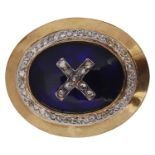 A Victorian diamond and enamel oval shaped brooch