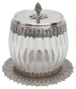 A late Victorian electroplated and cut glass biscuit barrel on stand