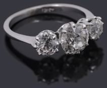 An impressive three stone diamond ring