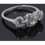 An impressive three stone diamond ring