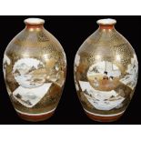 A pair of Japanese Meji period Kutani porcelain vases