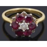 A ruby and diamond cluster ring