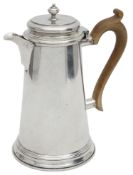 A modern silver George II style coffee pot