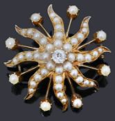 A Victorian diamond and split pearl star burst brooch