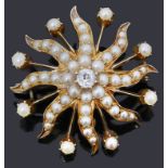 A Victorian diamond and split pearl star burst brooch