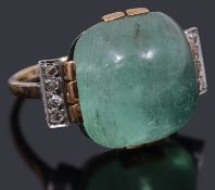 An Art deco gold single stone emerald cabochon ring