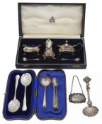 A small collection of silver to include a cased Garrard three piece cruet set