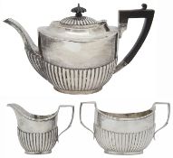 A George V silver three piece tea service