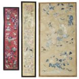 Three framed and glazed Chinese textiles