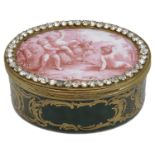 A late 18th Century gilt metal mounted oval enamel table box