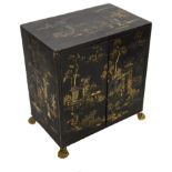 A mid 19th century Chinese export gilt decorated black lacquer table cabinet
