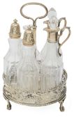 A George III silver five bottle cruet stand