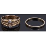 A gold two stone diamond ring,