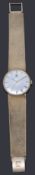 A gentleman's 9ct gold Tissot mechanical bracelet watch,