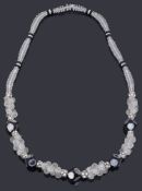 An Art Deco single row glass and mirrored bead necklace