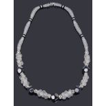 An Art Deco single row glass and mirrored bead necklace