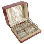 A cased set of four George VI Art Deco silver four division toast racks