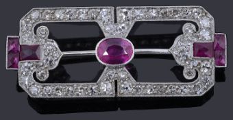An Art Deco ruby and diamond open plaque brooch