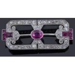 An Art Deco ruby and diamond open plaque brooch