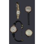 Four assorted gold watch heads
