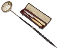 A George III ivory handled silver child's knife and fork set in a fitted case; one other