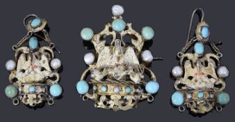 An early 20th century Austro-Hungarian silver gilt gem set pendant and earrings suite