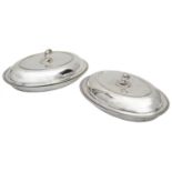 A pair of George III silver oval entree dishes and covers