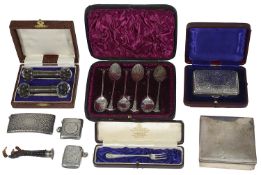 A mixed lot of mostly Edwardian silver to include a cigarette case in a fitted case and vesta cases