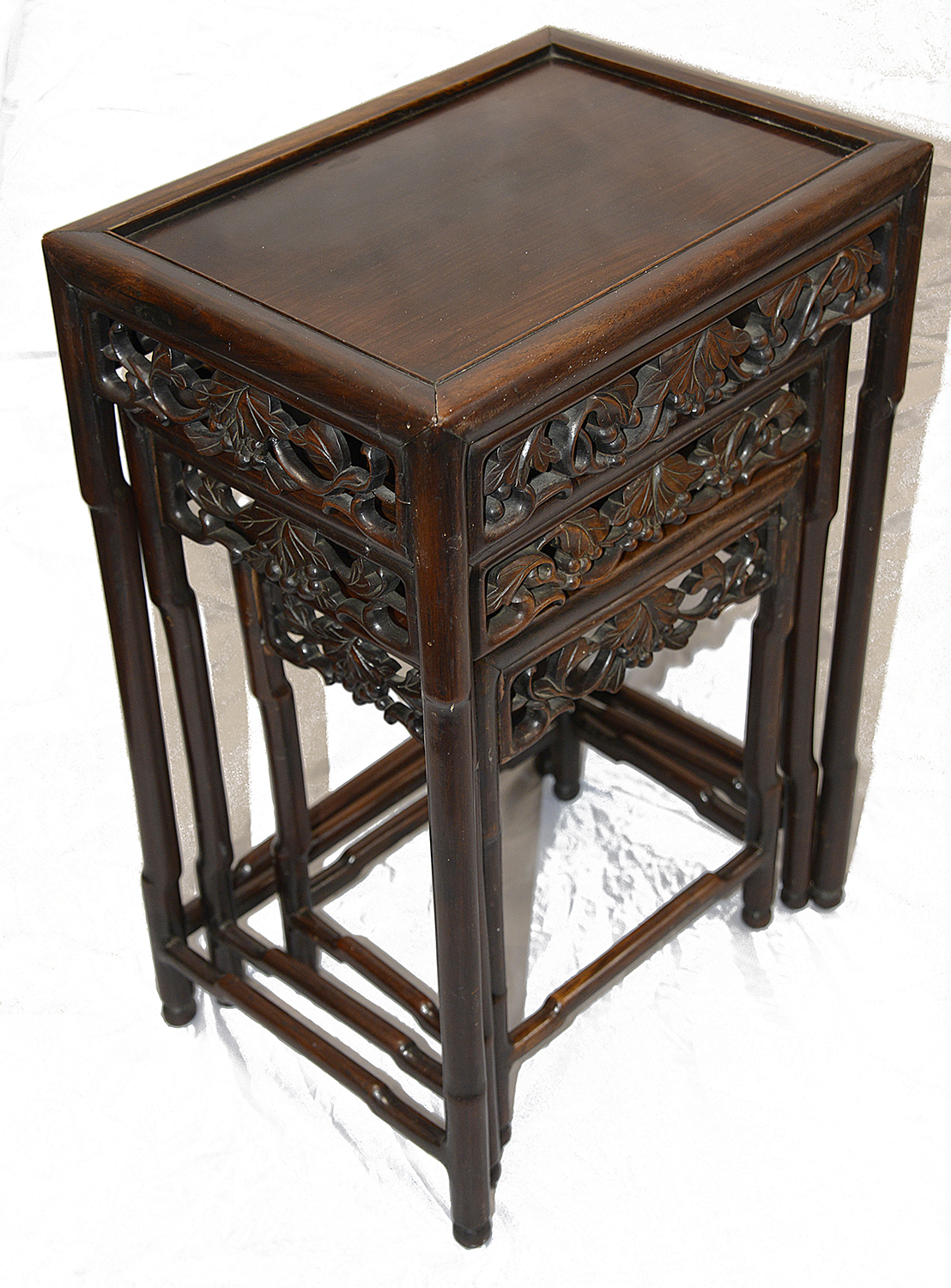 A late 19th century Chinese hardwood nest of three occasional tables - Image 2 of 6