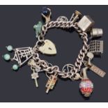 A 9ct gold charm bracelet with padlock and assorted charms