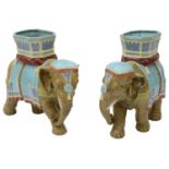 A pair of Victorian Royal Worcester majolica glazed elephants