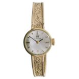 A 9ct gold ladies Tissot mechanical bracelet watch