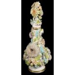 A mid 19th century possibly Coalbrookdale flower encrusted porcelain bottle vase and stopper