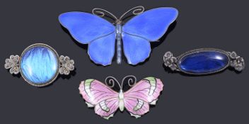 A collection of brooches