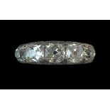 A early 19th c. graduated cushion-shaped old brilliant cut diamond five stone ring