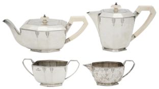 A George V Art Deco silver and ivory four piece tea service