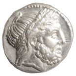 Philip II Macedon Tetradrachmc. 359-336 BCHead of Zeus, laureate, profile to right. Border of dots /
