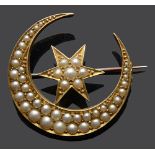 A Victorian split pearl star and crescent brooch