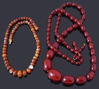 A single row graduated olive shaped cherry coloured bakelite bead necklace