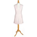 A Chanel pale pink flared dress