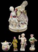 A Meissen style porcelain group and a selection of continental figures