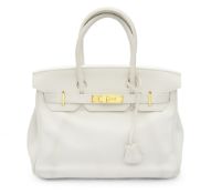 An Hermes Birkin 30 cream leather bag