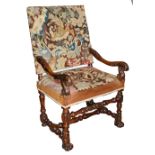 A late 17th century Flemish walnut and tapestry open armchair