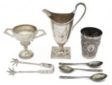 A modern silver helmet shaped cream jug in George III style, a German .800 beaker and other silver